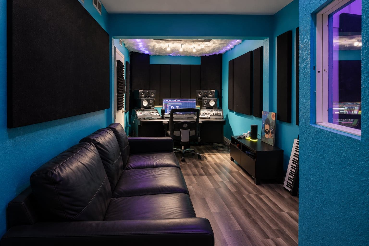 Wide view of the Aura Studios lounge and main workstation